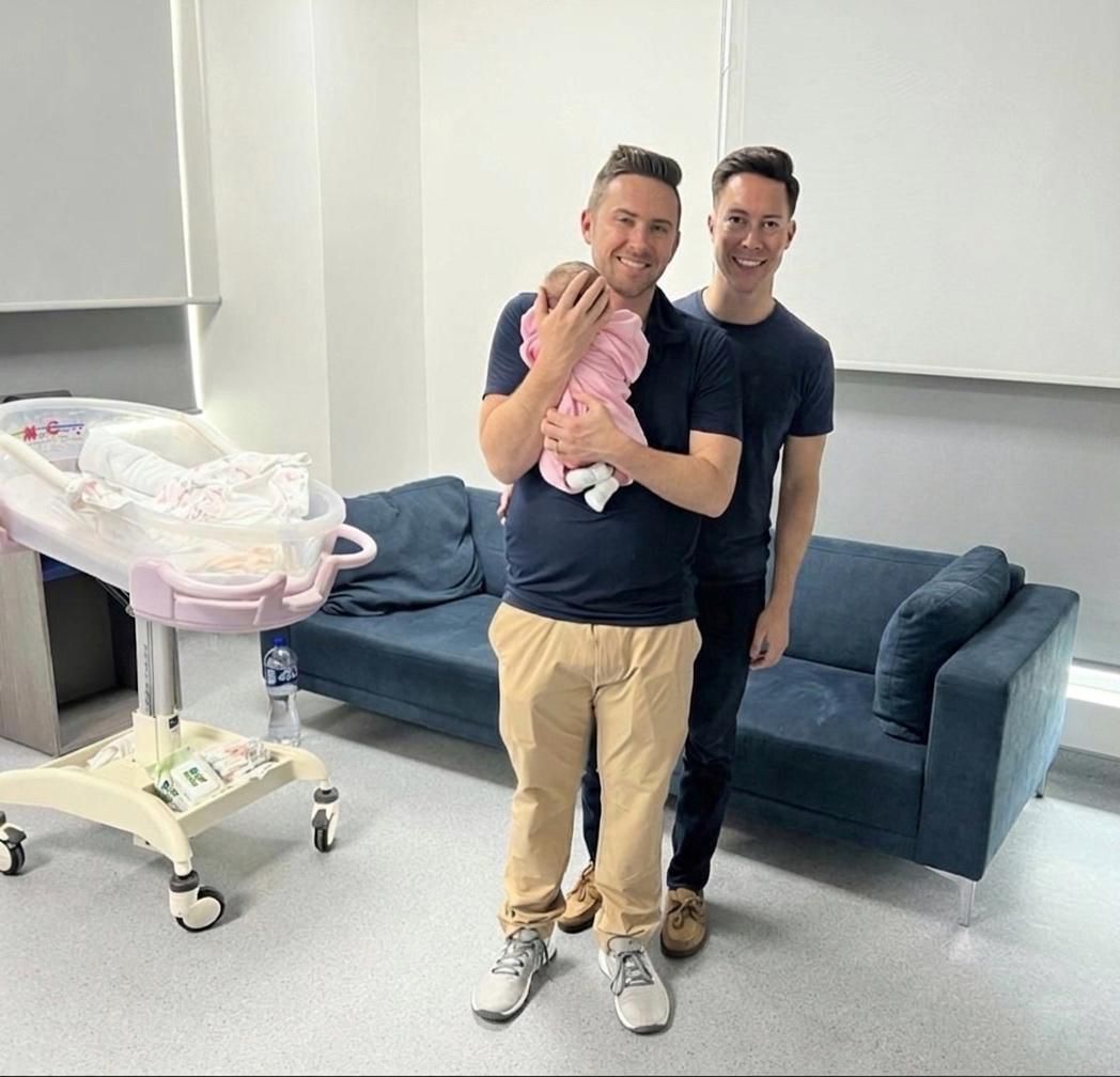 Canadian parents with their baby born through surrogacy in Mexico